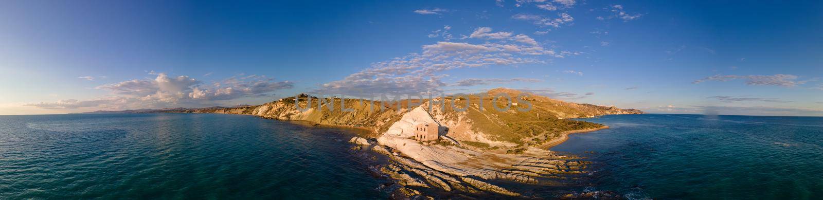 Punta Bianca, Agrigento in Sicily Italy White beach with old ruins of an abandoned stone house on white cliffs Sicilia Italy. 