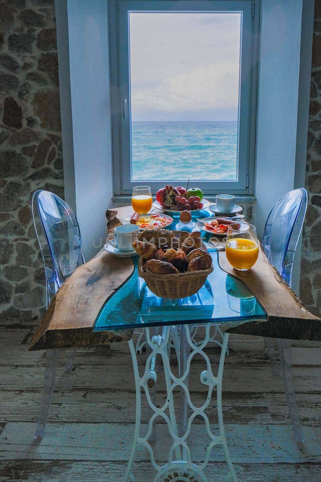 breakfast with a view over the ocean from the window,Cefalu, medieval village of Sicily island, Province of Palermo, Italy. Europe