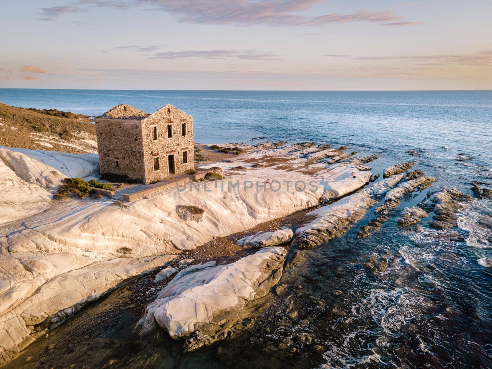 Punta Bianca, Agrigento in Sicily Italy White beach with old ruins of abandoned stone house on white cliffs by fokkebok