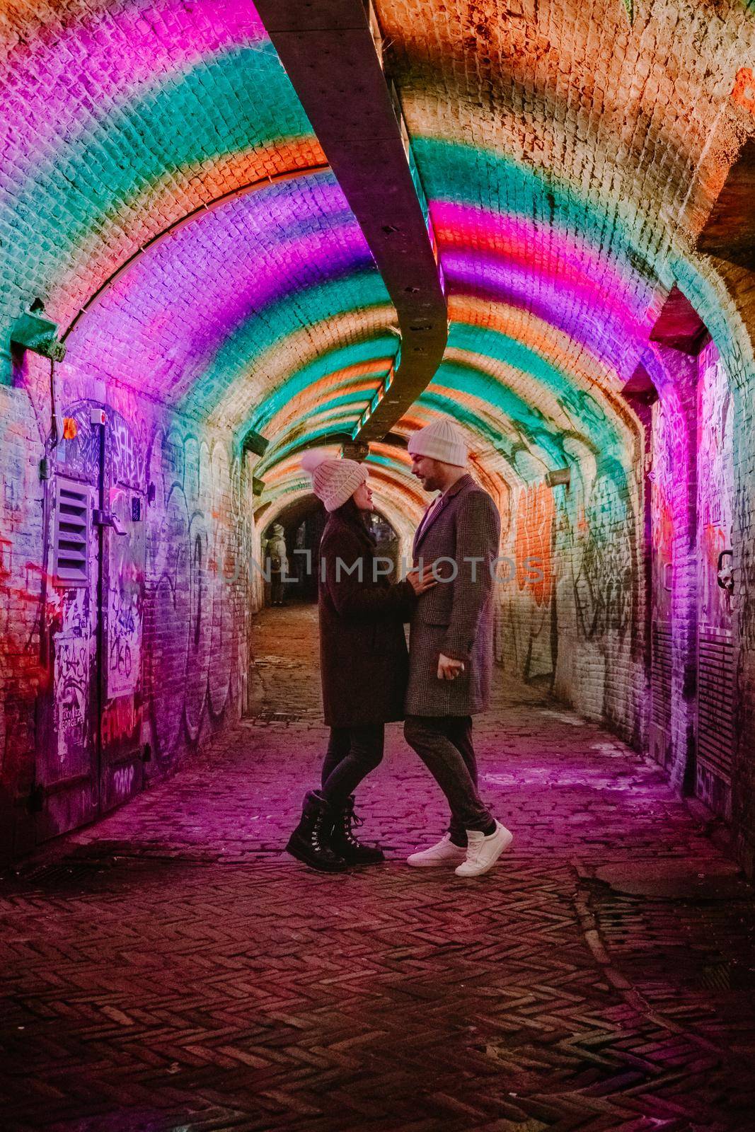  Utrecht Netherlands January 2021, colorful green, blue, pink illuminated Ganzemarkt tunnel in the center of Utrecht, The Netherlands