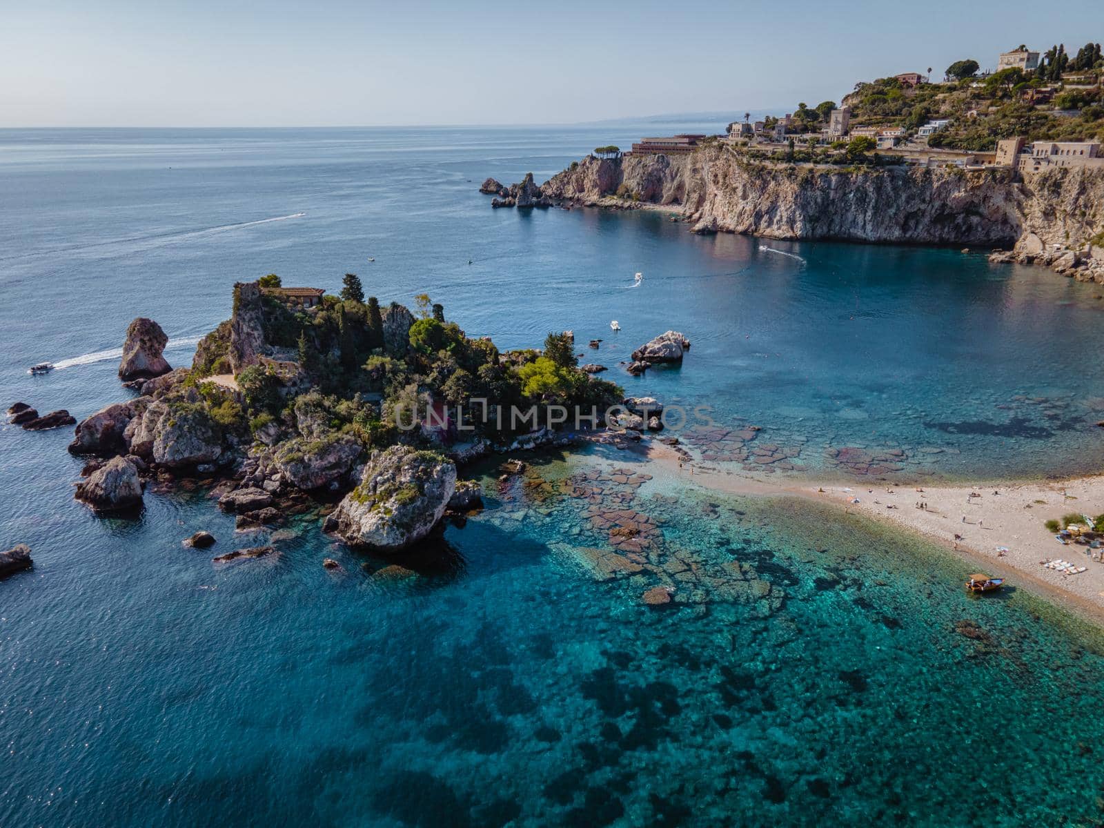 Isola Bella at Taormina, Sicily, Aerial view of island and Isola Bella beach and blue ocean water in Taormina, Sicily, Italy by fokkebok