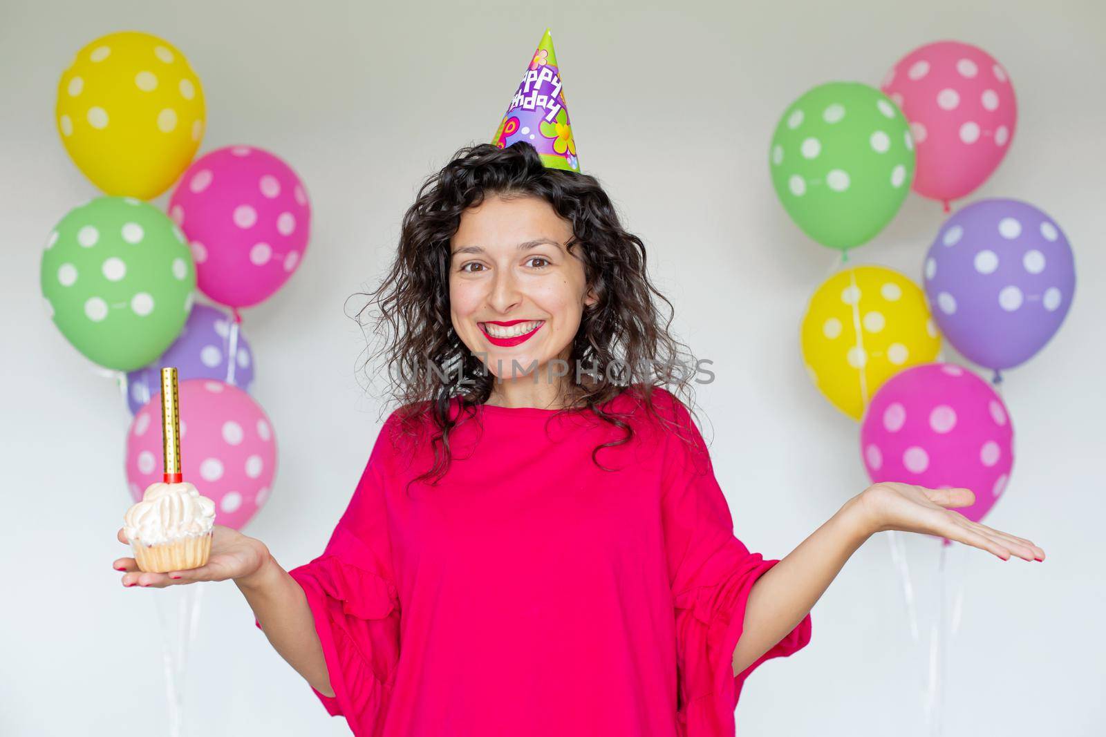 Happy Birthday. Sexy brunette girl posing with balloons, fireworks, colorful balloons and holiday cake on a white background by Try_my_best