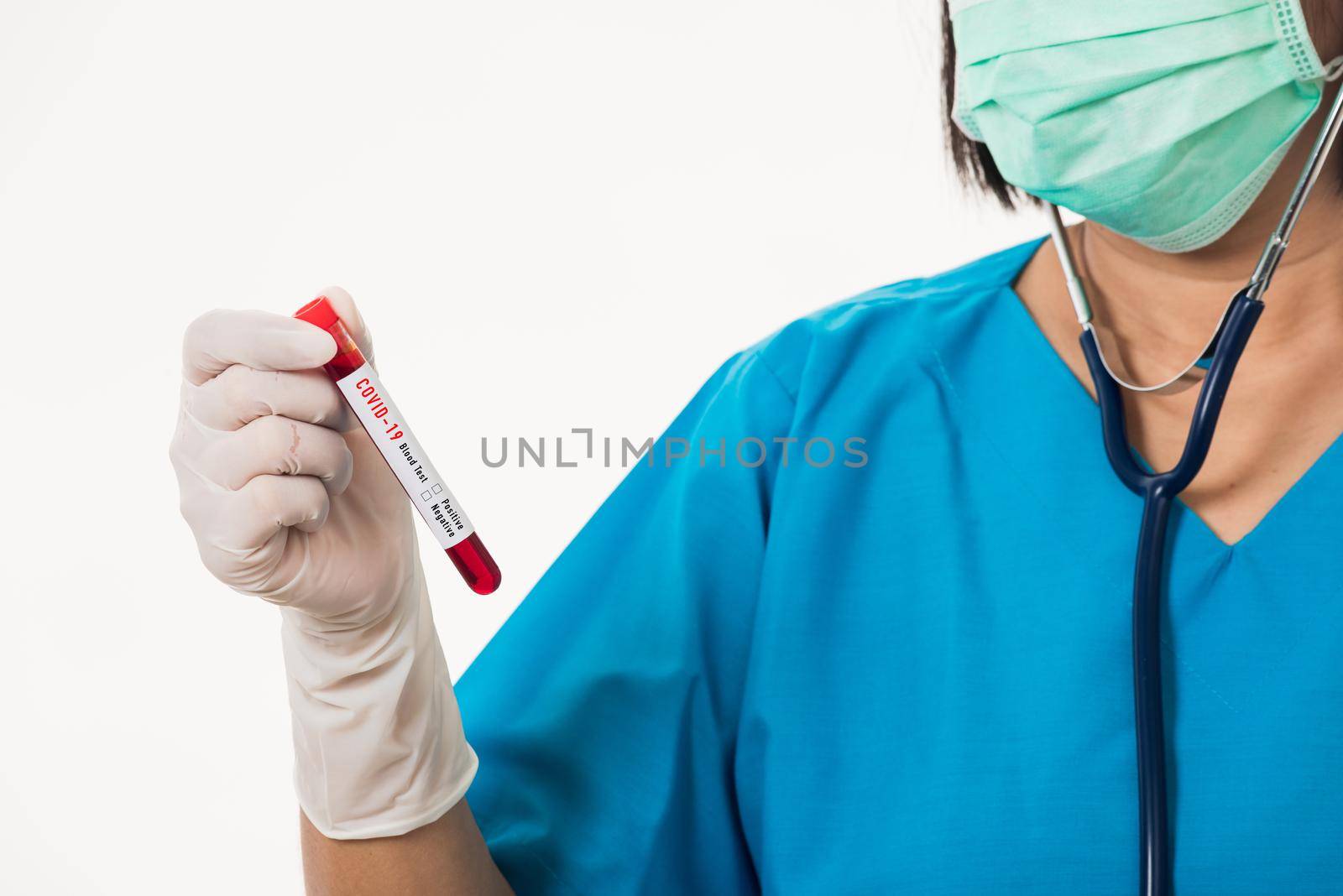 Nurse in blue uniform wear a mask holding test tube sample Coronavirus test blood in the laboratory for analyzing isolated on white background, medicine COVID-19 pandemic outbreak concept