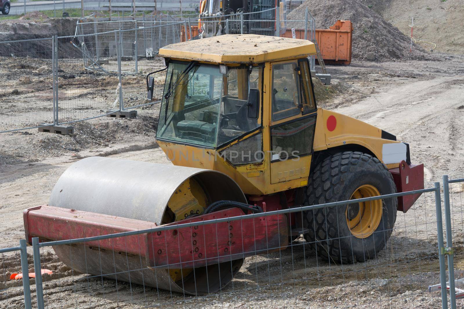 Steamroller, on a construction site during leveling work on a road
