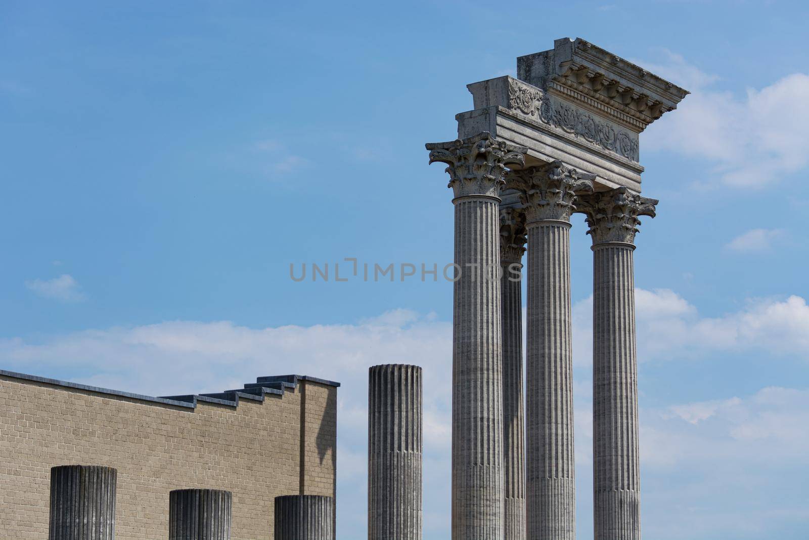 Greek columns of a temple in Greece, seen from below. Architecture, history, travel, landscapes