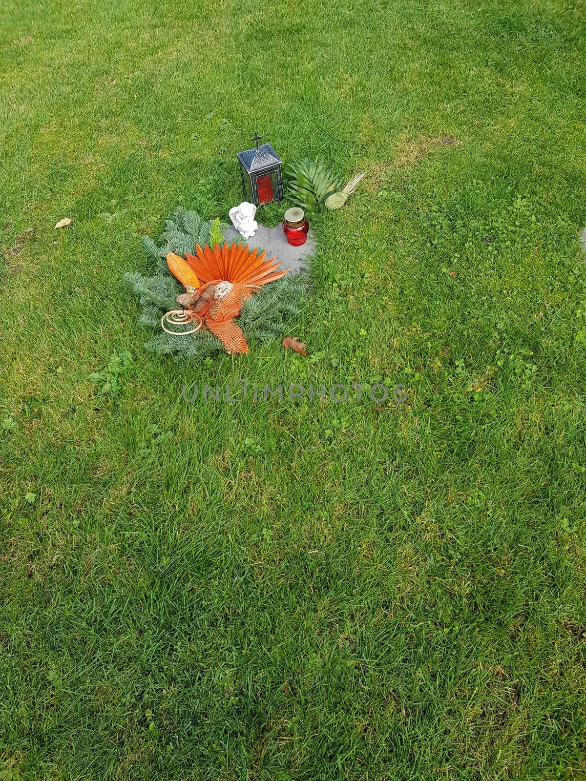 Colorful flower decoration during All Saints Day in the cemetery