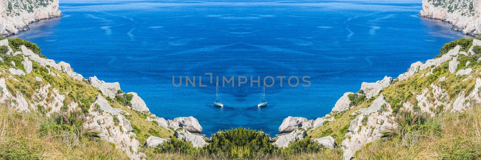 Lonely bay in picturesque seascape with 2 sailboats             by JFsPic