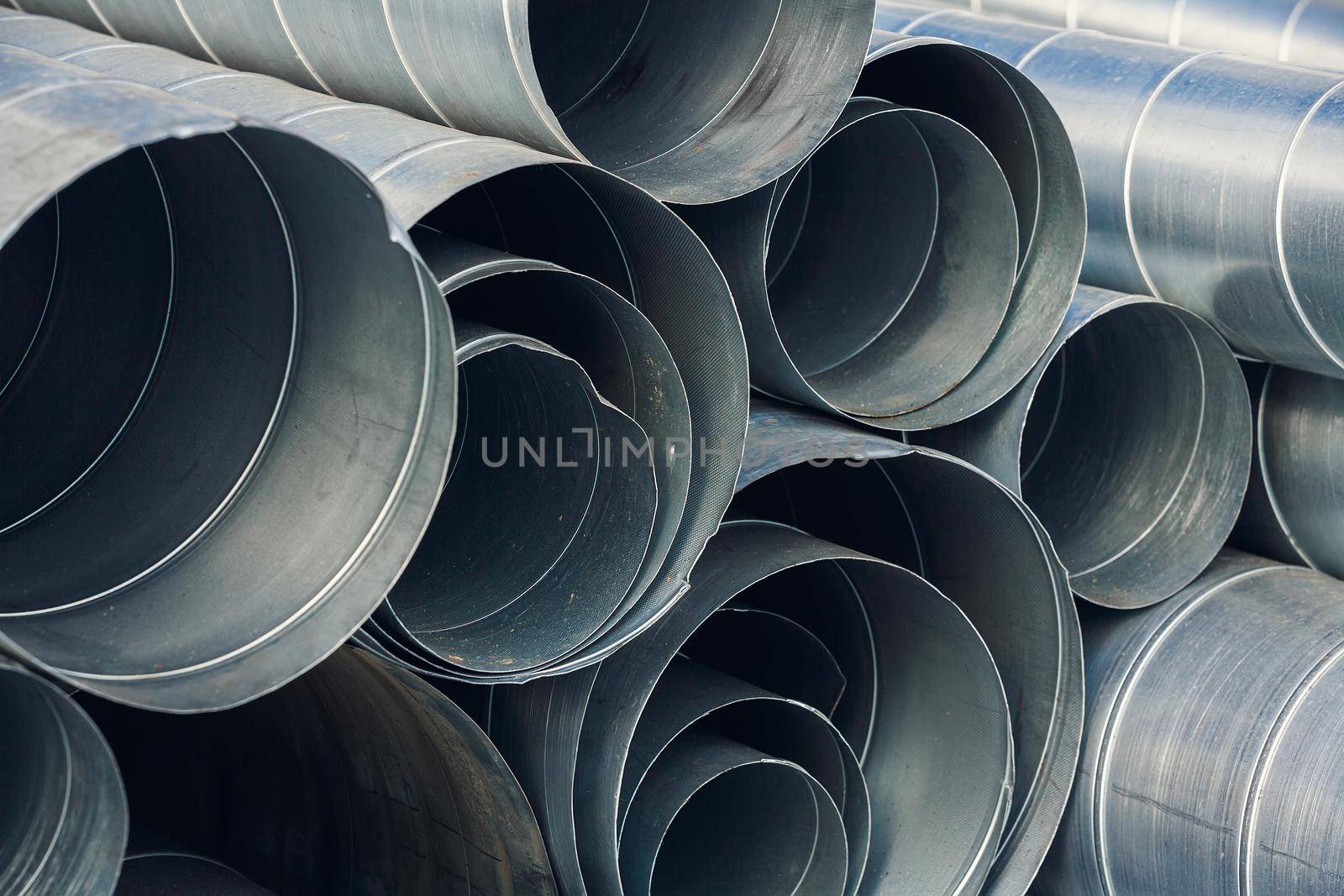 Pipes for exhaust ventilation. Background. Dismantling and construction at the facility.