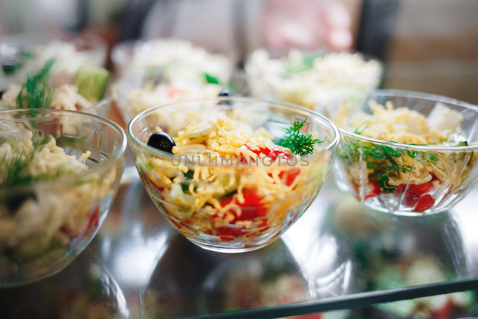 A portion of salad is on display in the public dining room. A light and healthy snack