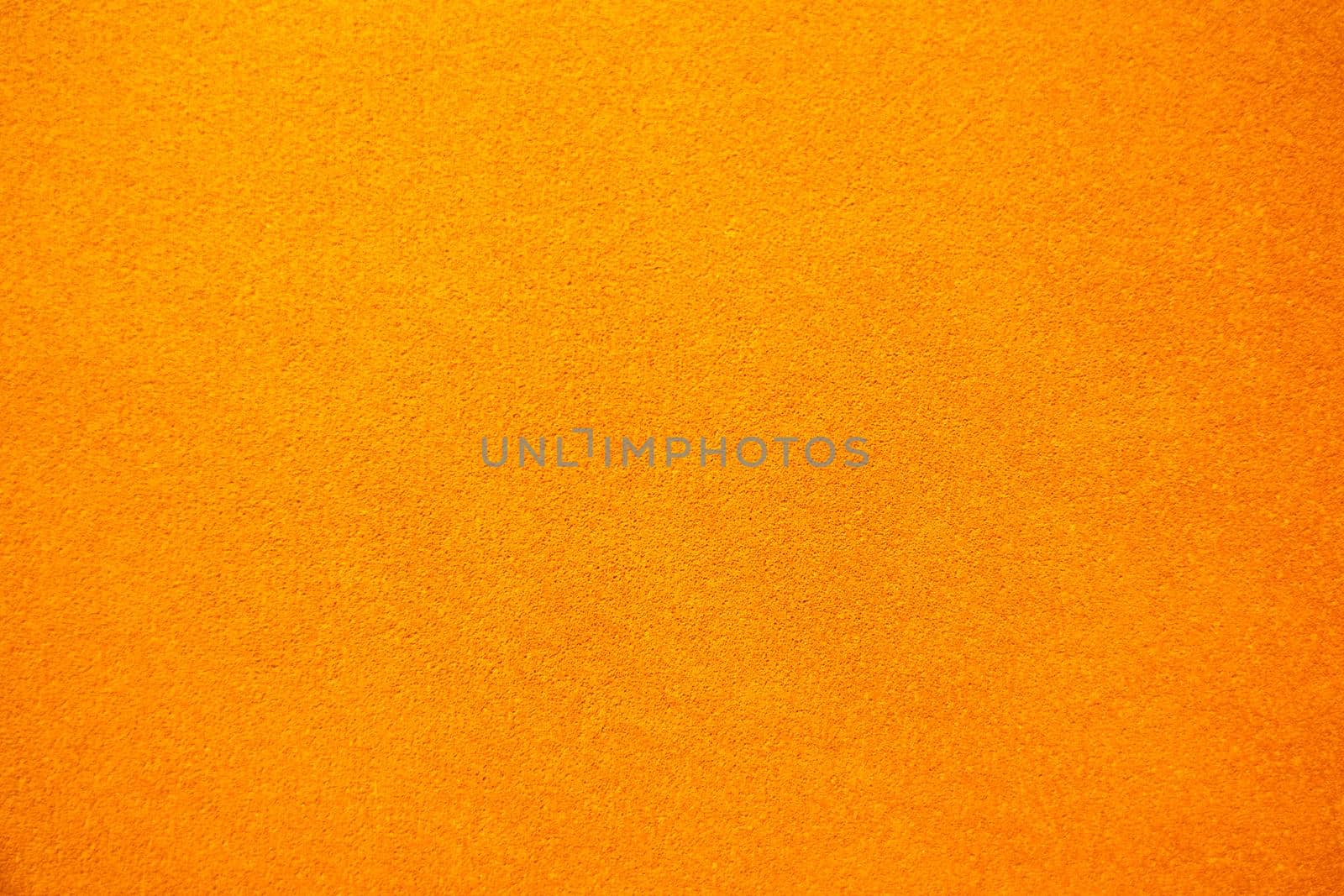 Bright solid color background. Empty orange surface with fine texture. Preparation for designer or layout by SergeyPakulin