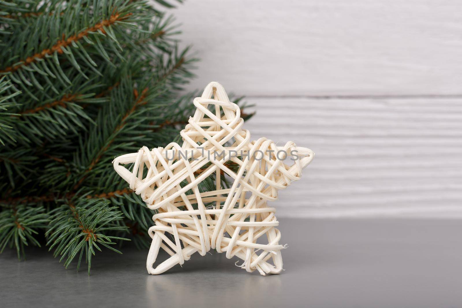 White Christmas star with Christmas tree against white wooden background by Senorina_Irina