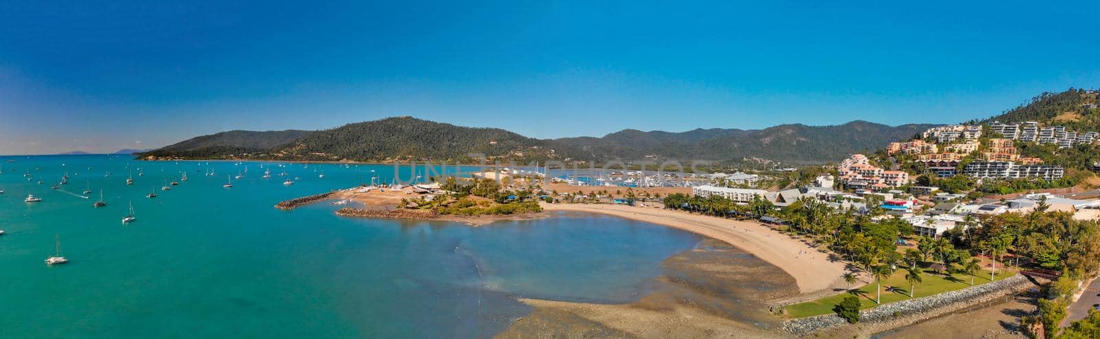 Panoramic aerial view of Airlie Beach on a beautiful sunny day by jovannig