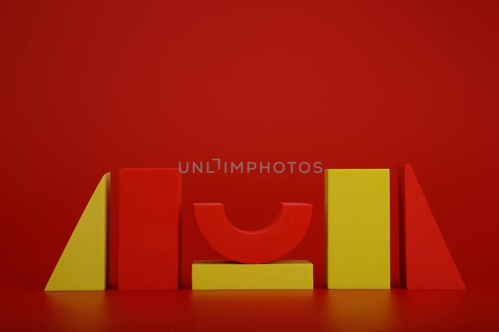 Abstract duotone background with red and yellow geometric figures on red background with copy space by Senorina_Irina