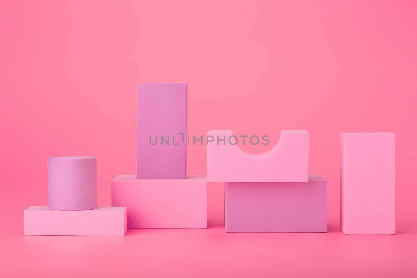 Light abstract background with pink and purple geometric figures against bright pink background by Senorina_Irina