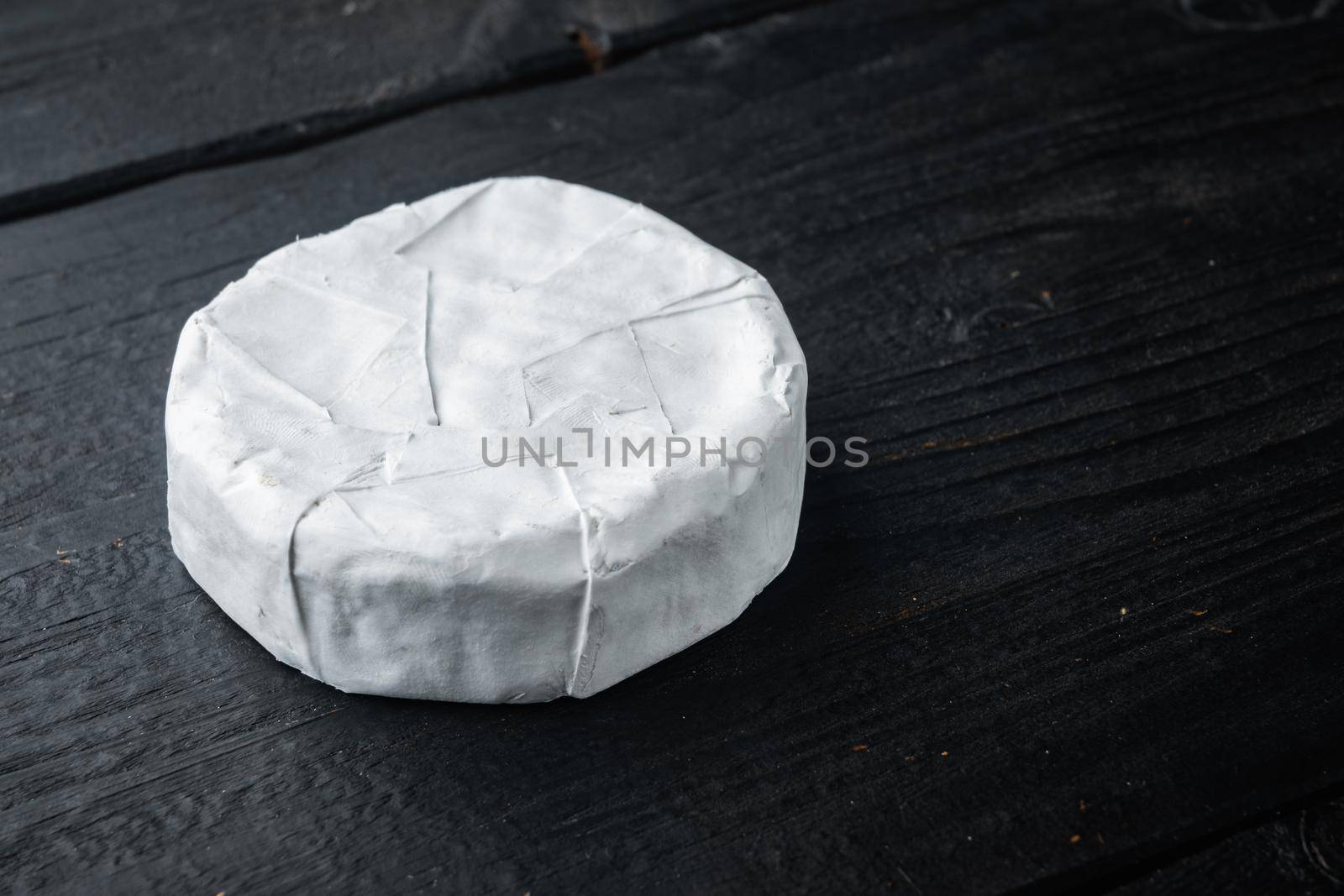 Farm cheese camembert set, on black wooden background with copy space for text