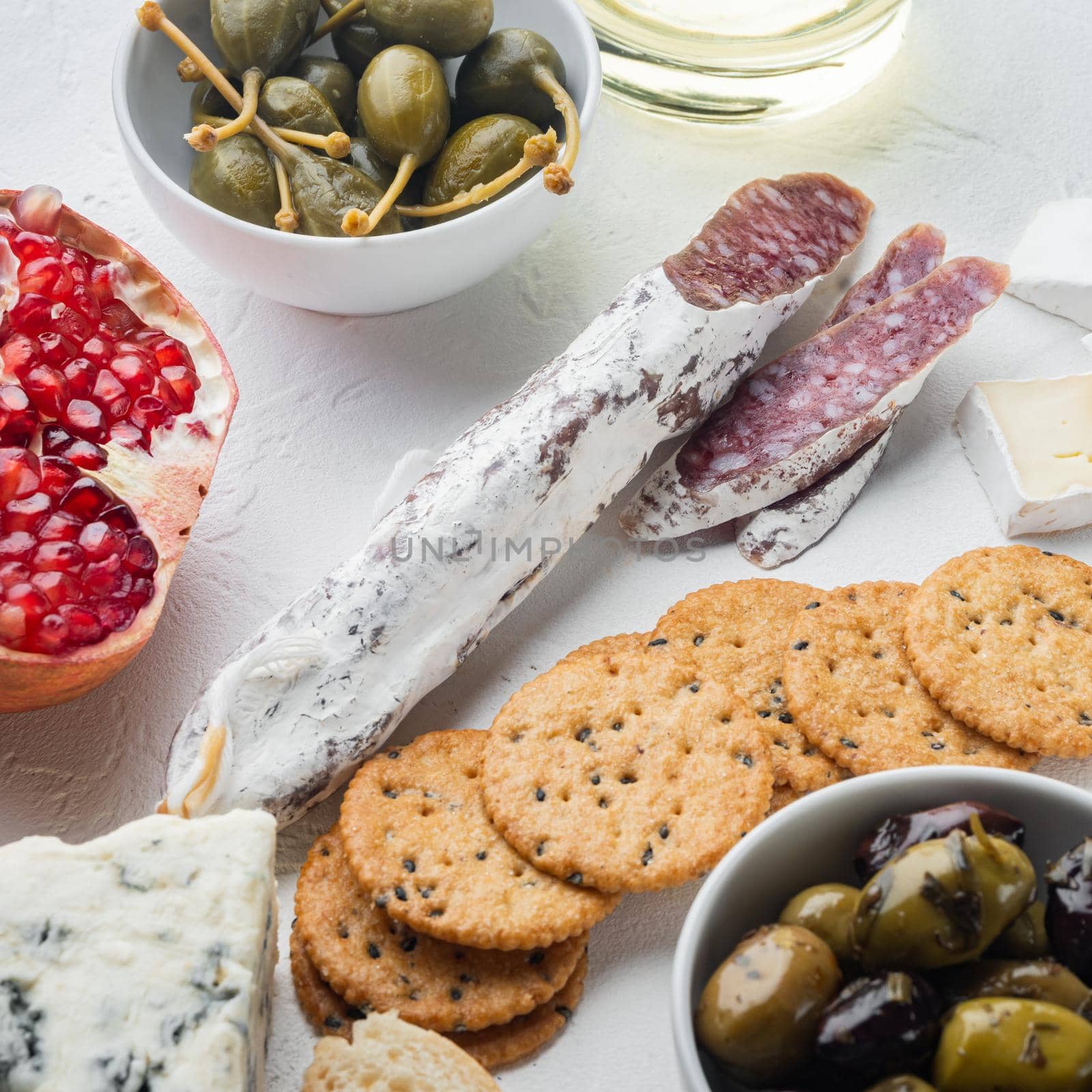 Classic italian antipasti, on white background by Ilianesolenyi