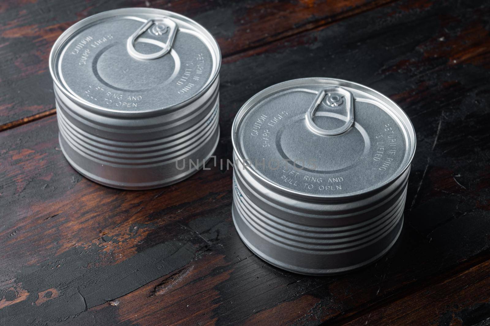Canned sauce tin can, on old wooden table