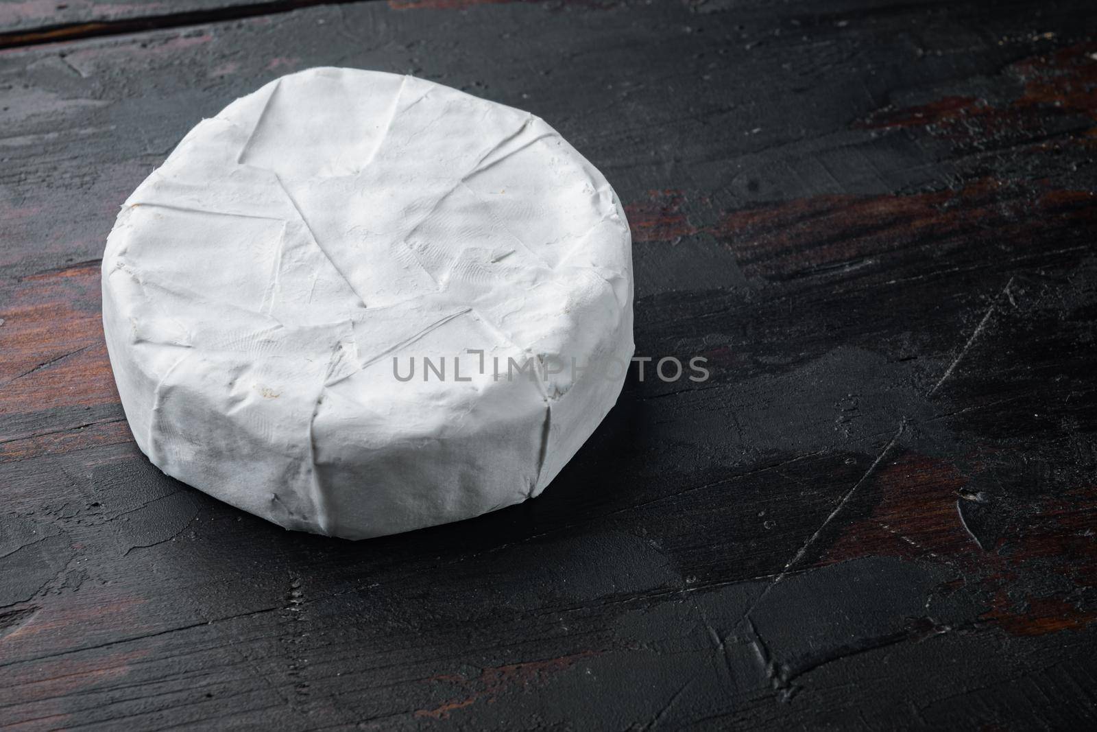 Farm cheese camembert set, on old wooden table with copy space for text
