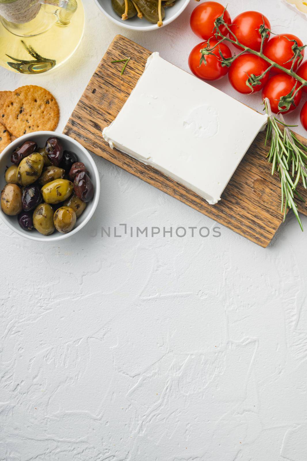 Cheese feta greek salad ingredient, on white background, top view with copy space for text