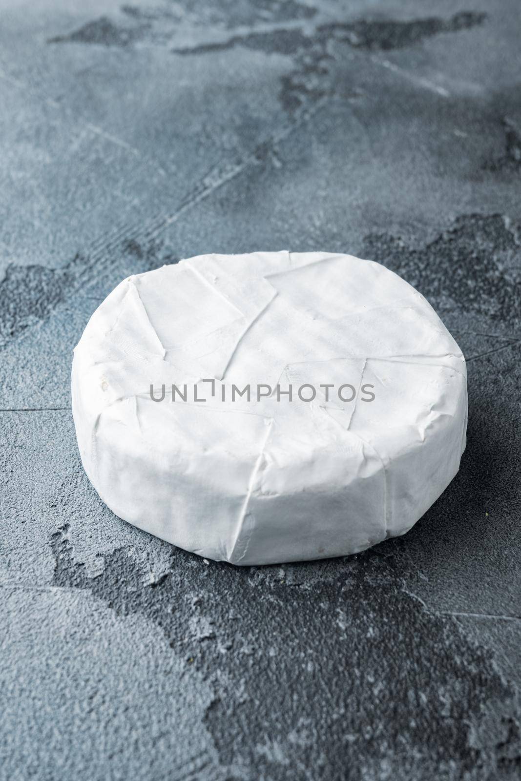 French soft camembert of normandy cheese set, on gray background