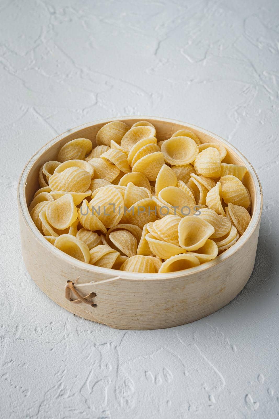 Durum wheat semolina pasta, on white background