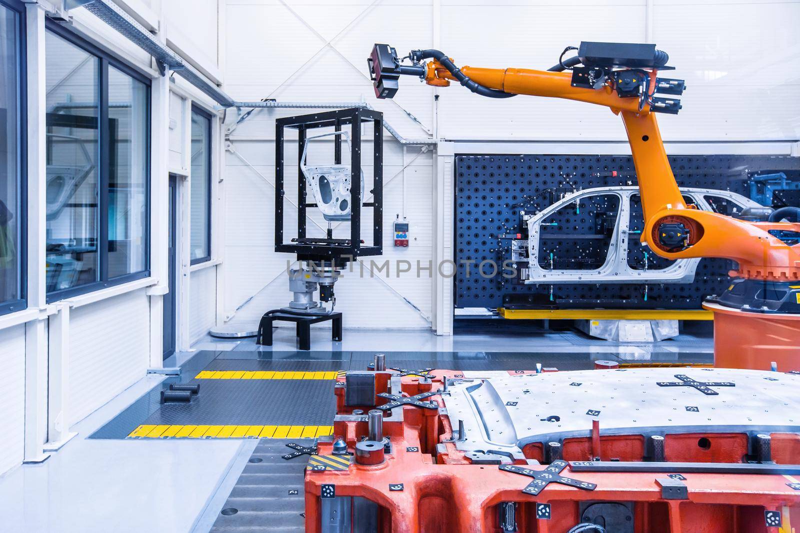 learning of a robotic arm in a car plant