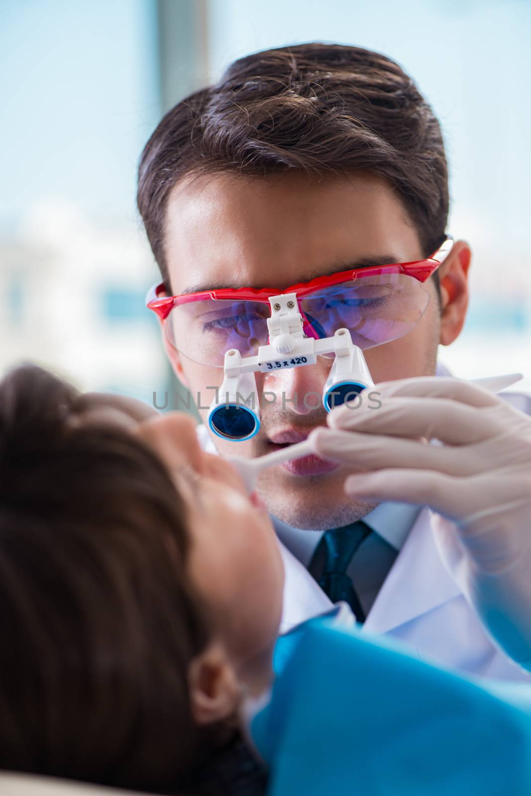 Patient visiting dentist for regular check-up and filling