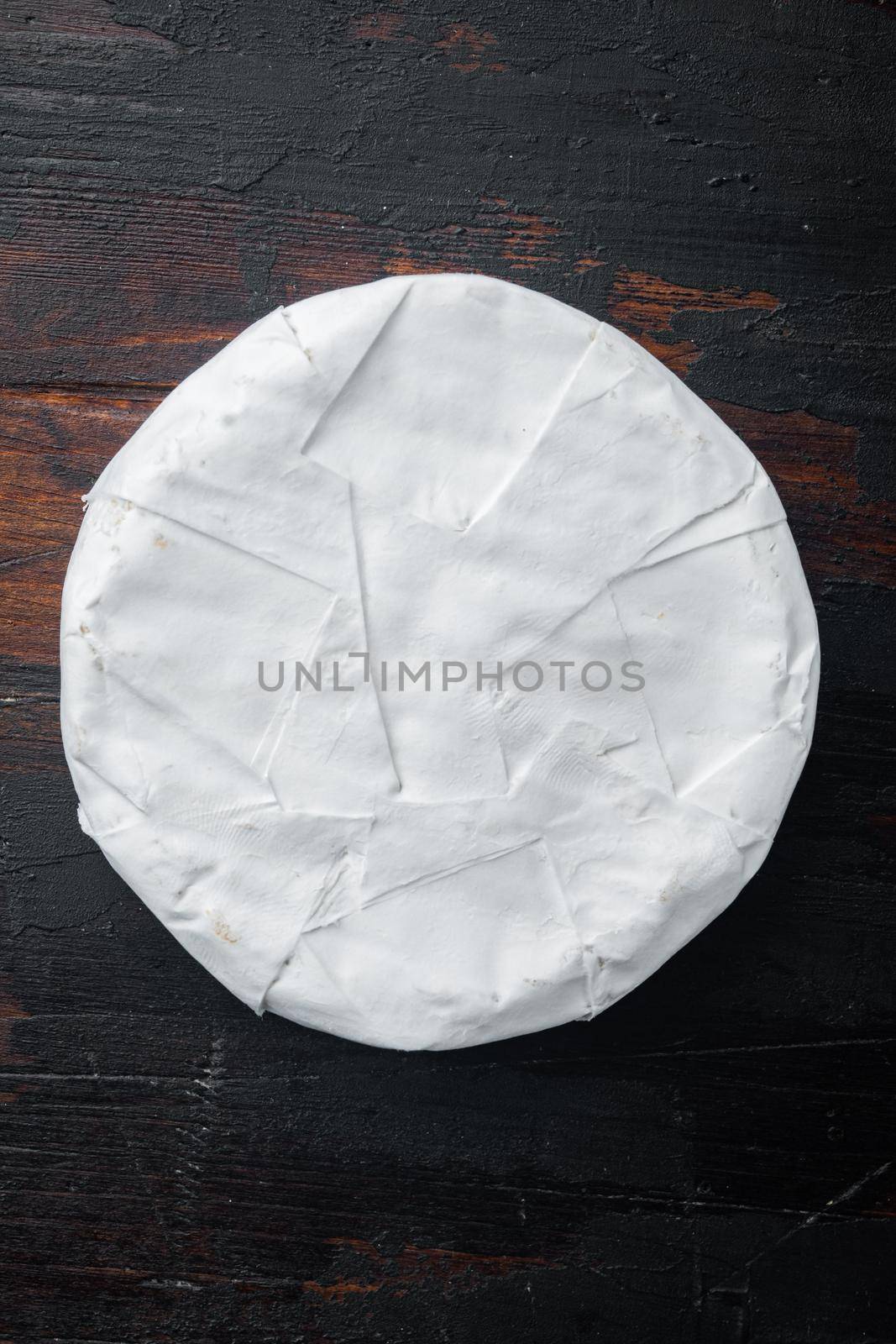 French soft camembert of normandy cheese set, on old wooden table, flat lay