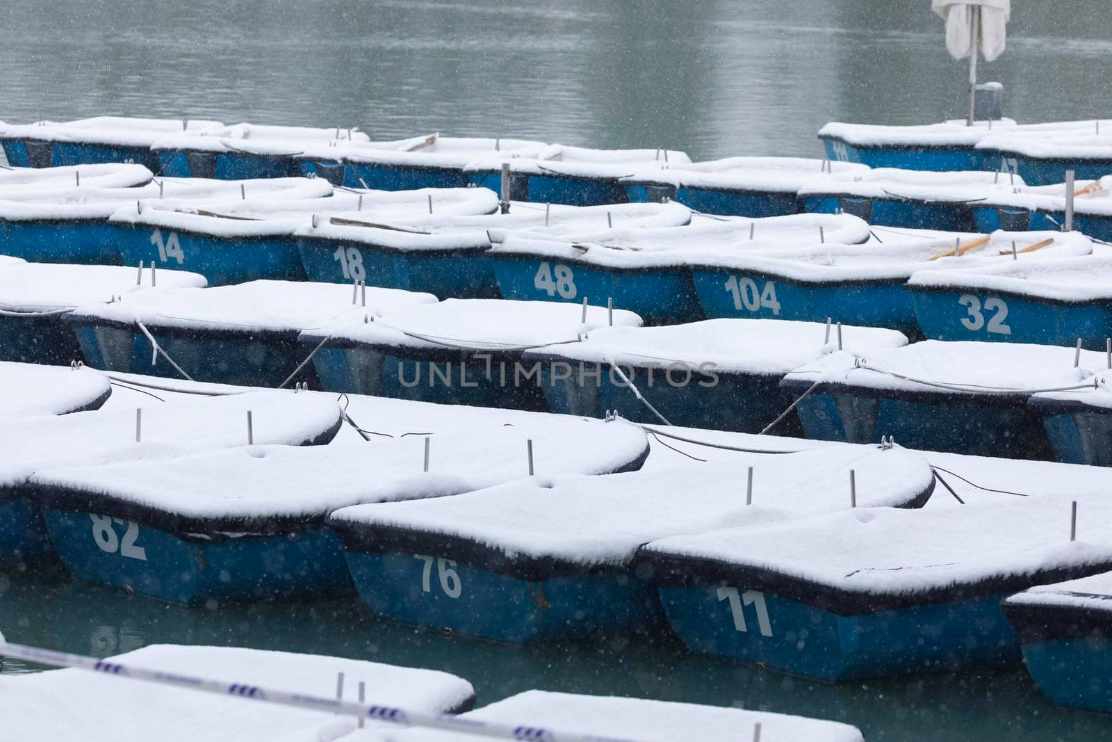 Boats covered with snow, Retiro, Madrid. by alvarobueno