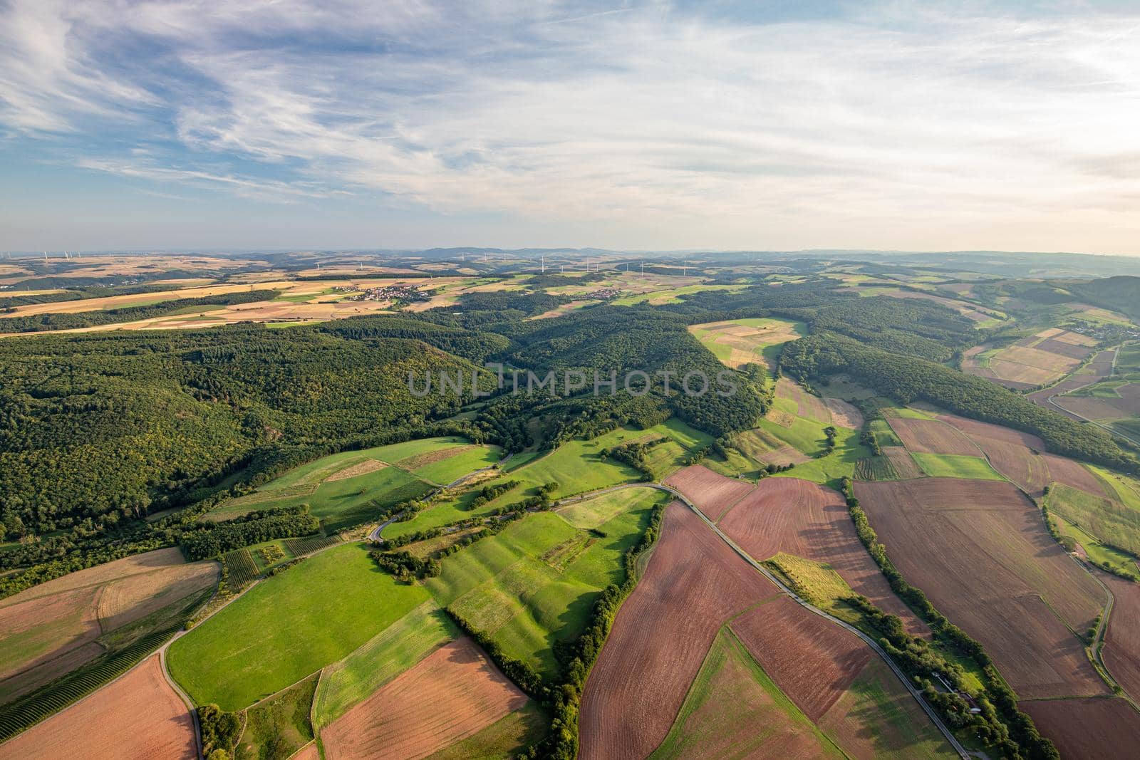 Aerial view at a landscape in Germany, Rhineland Palatinate near Bad Sobernheim with  meadow, farmland, forest, hills, mountains 