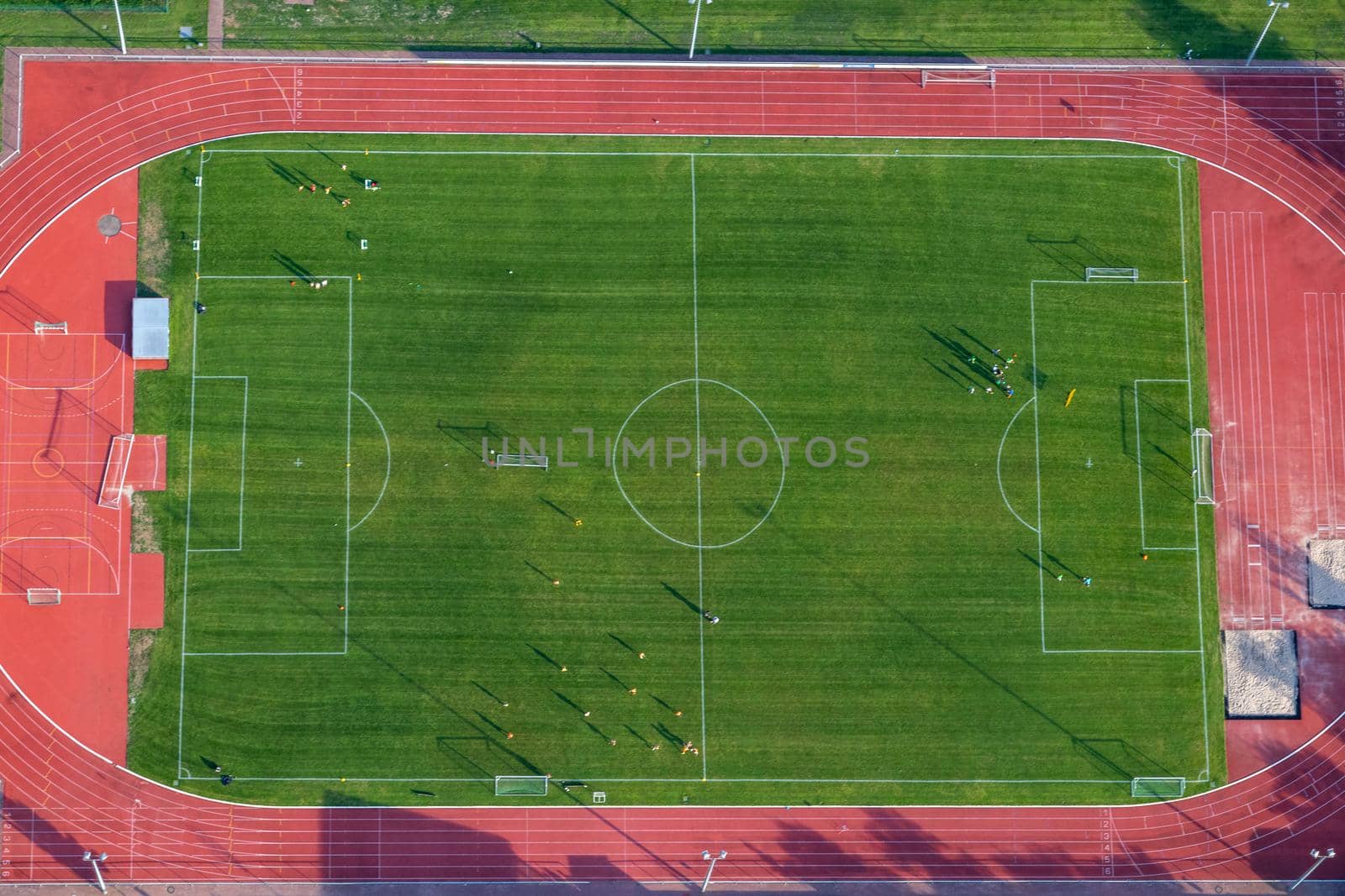 Aerial view at a soccer field with soccer players in Germany, Rhineland Palatinate near Bad Sobernheim 