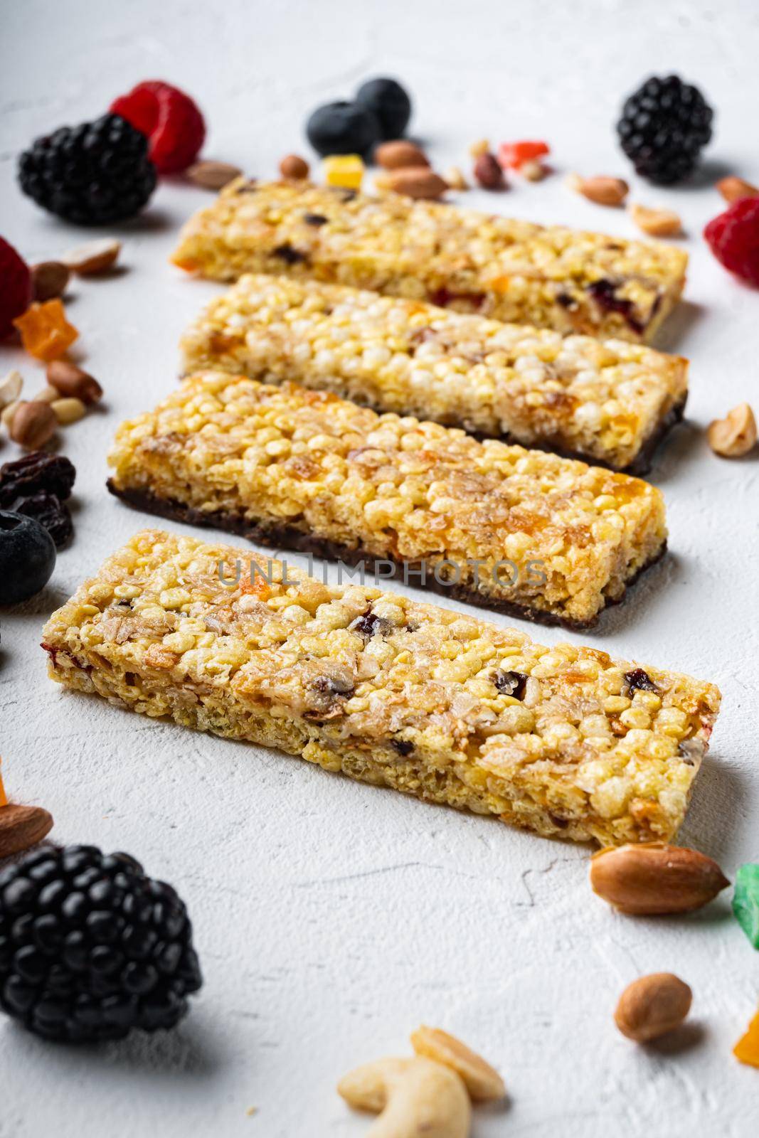 Fruit berry, nut energy bars. Healthy snack, on white background