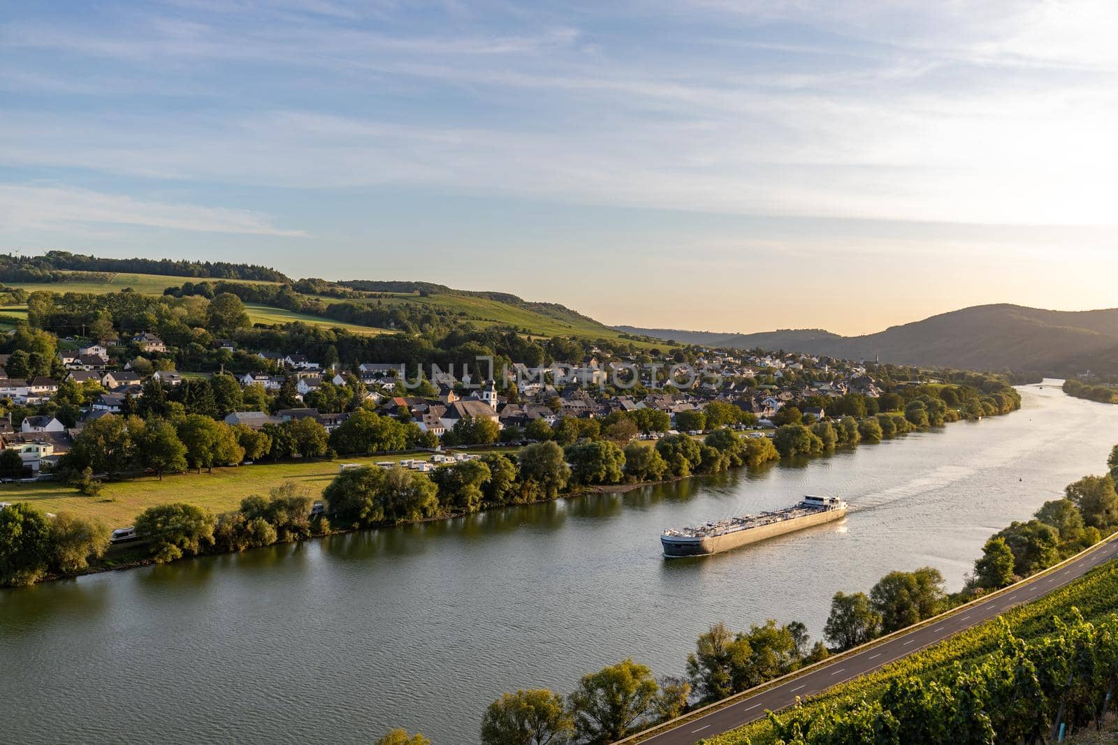 Panoramic view of the Moselle valley with the wine village Brauneberg in the background on a sunny autumn day