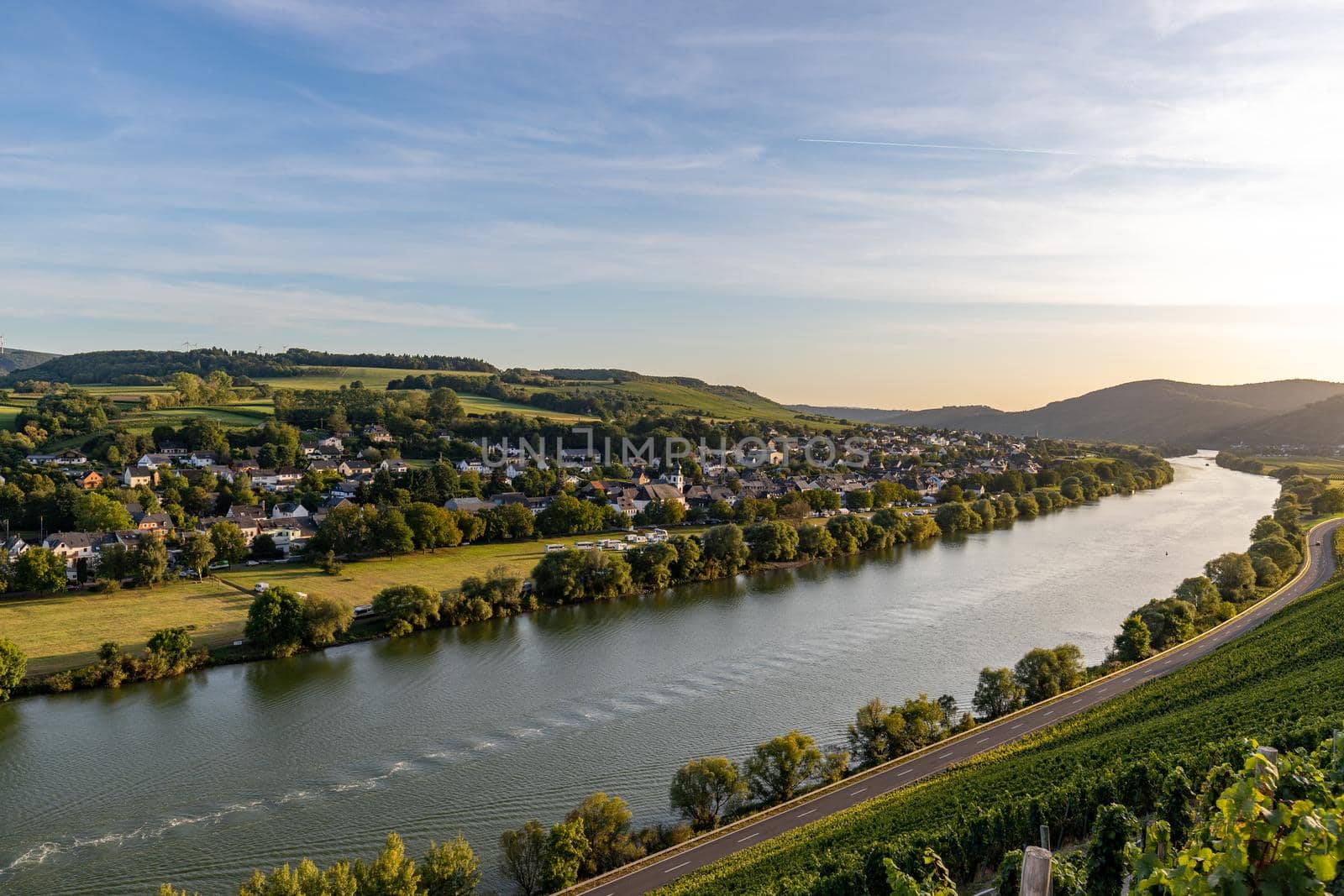 Panoramic view of the Moselle valley with the wine village Brauneberg in the background on a sunny autumn day