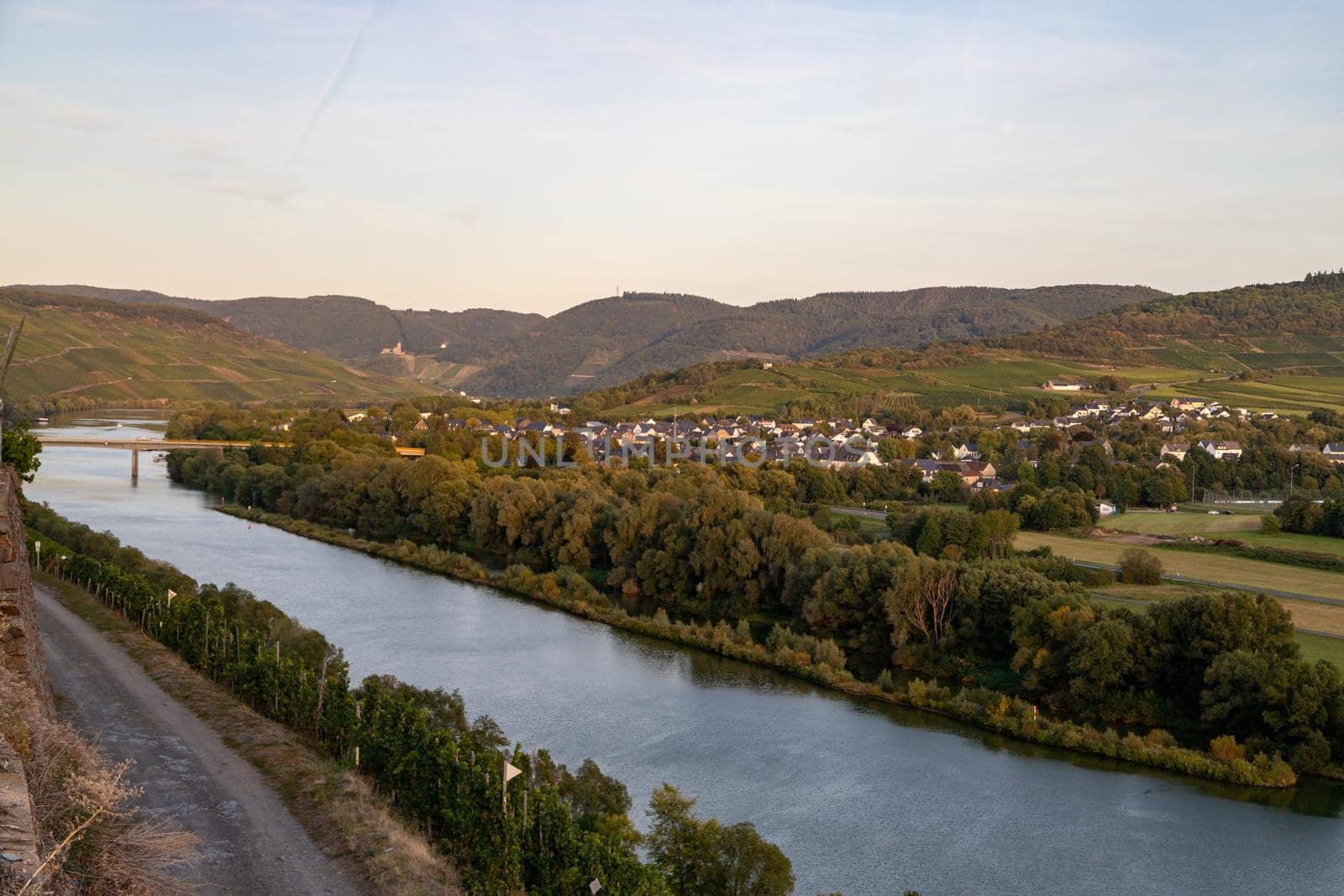 Panoramic view of the Moselle valley with the wine village Mülheim in the background on a sunny autumn day
