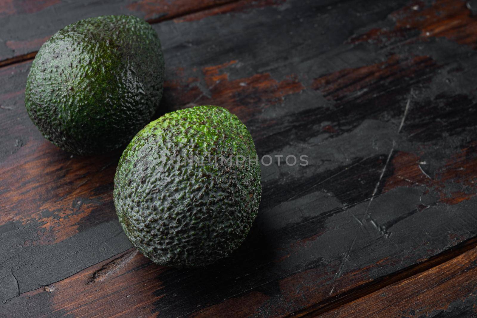 Ripe pair of green avocado set, on old wooden table