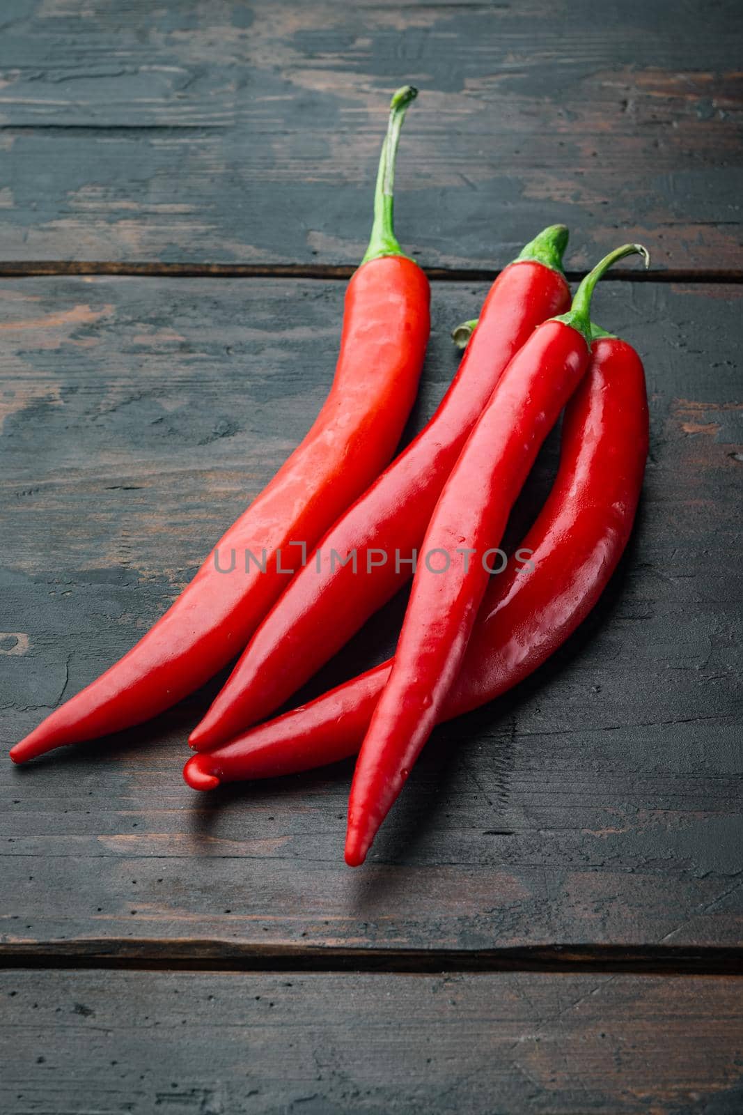 Ripe red chili peppers set, on old wooden table