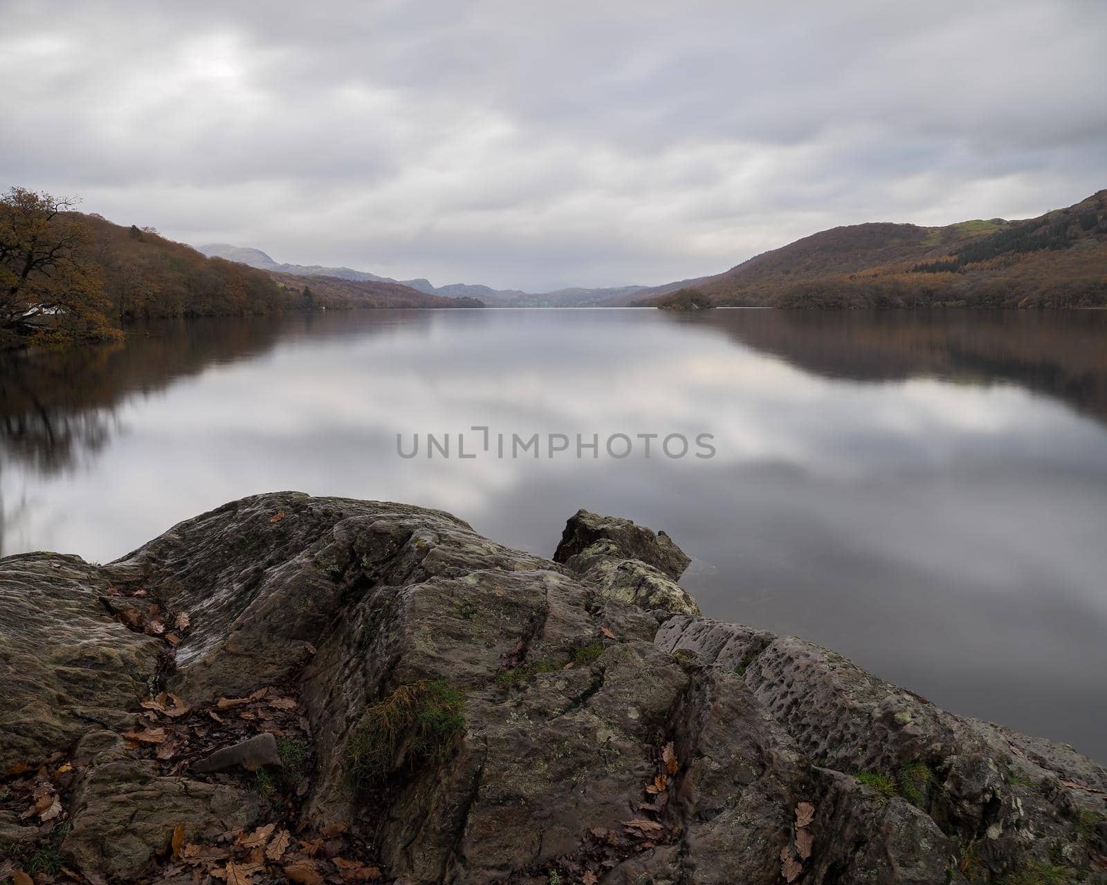 View over Coniston Water with clouds reflected in the water, Lake District by PhilHarland