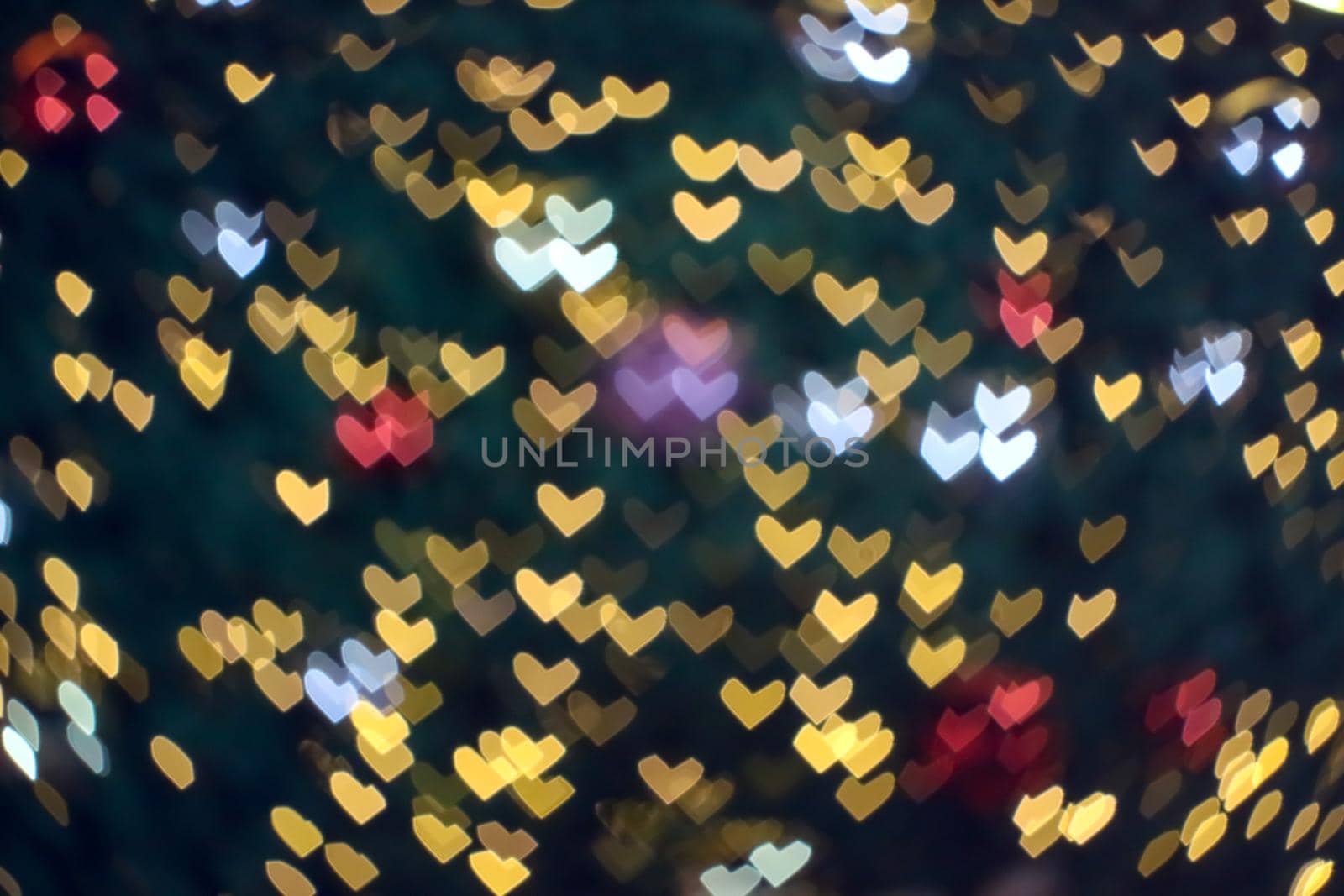 blur and bokeh heart shape love valentine night light at shopping mall