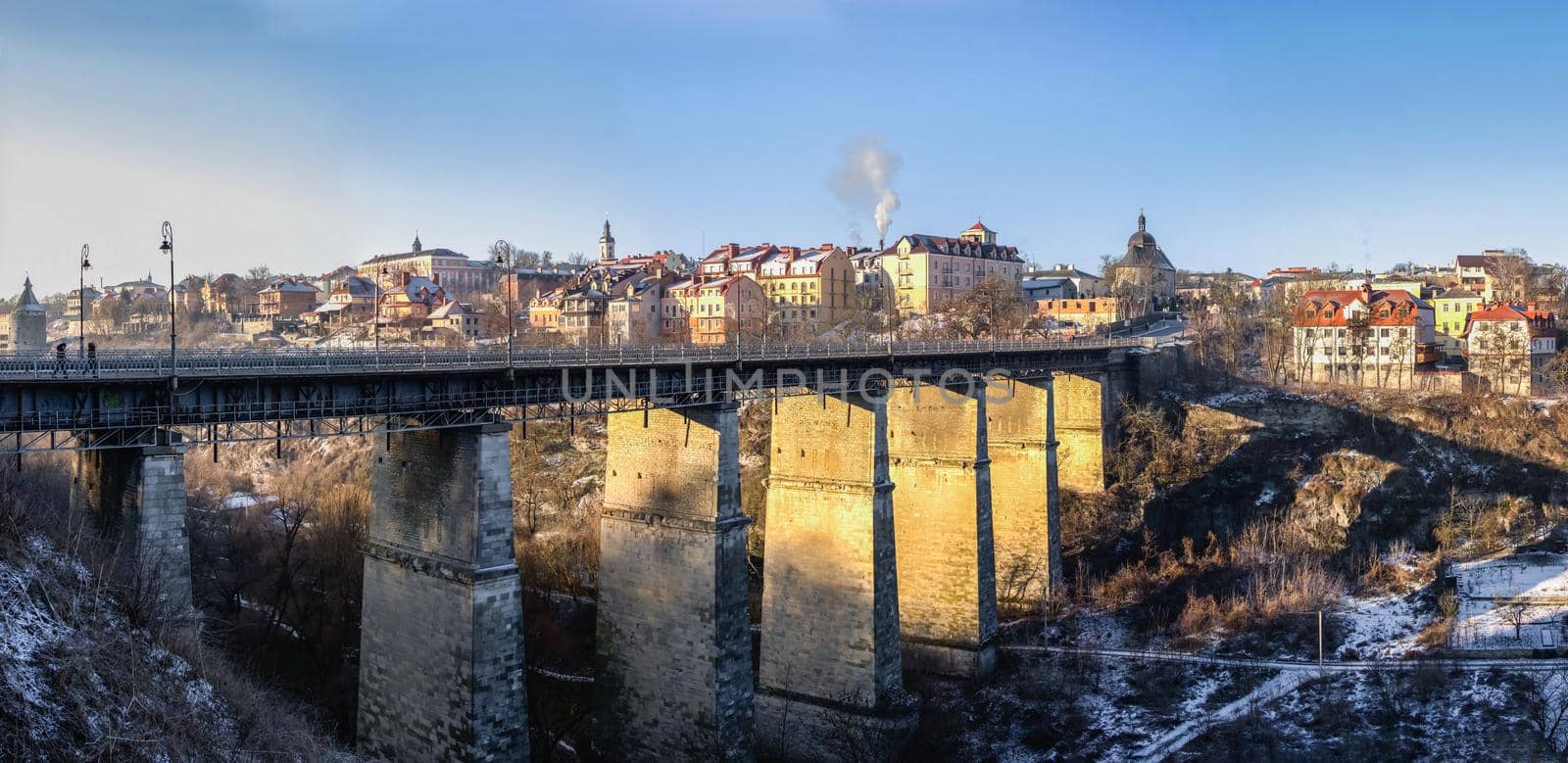 Kamianets-Podilskyi, Ukraine 01.07.2020. Novoplanovsky bridge over the Smotrytsky canyon in Kamianets-Podilskyi on a sunny winter morning