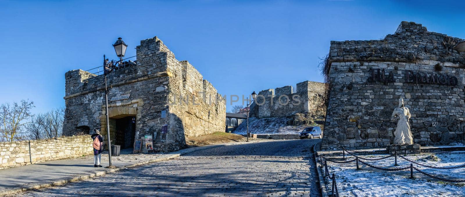 Kamianets-Podilskyi, Ukraine 01.07.2020. City gate of the Kamianets-Podilskyi old town on a sunny winter morning