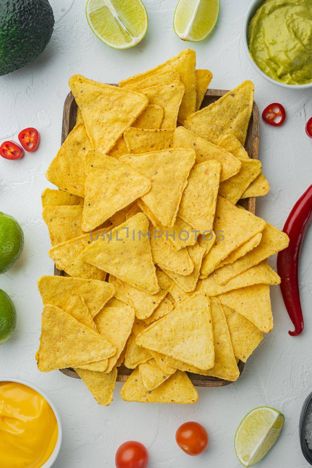 Mexican nachos with sauce set, on white background, top view or flat lay