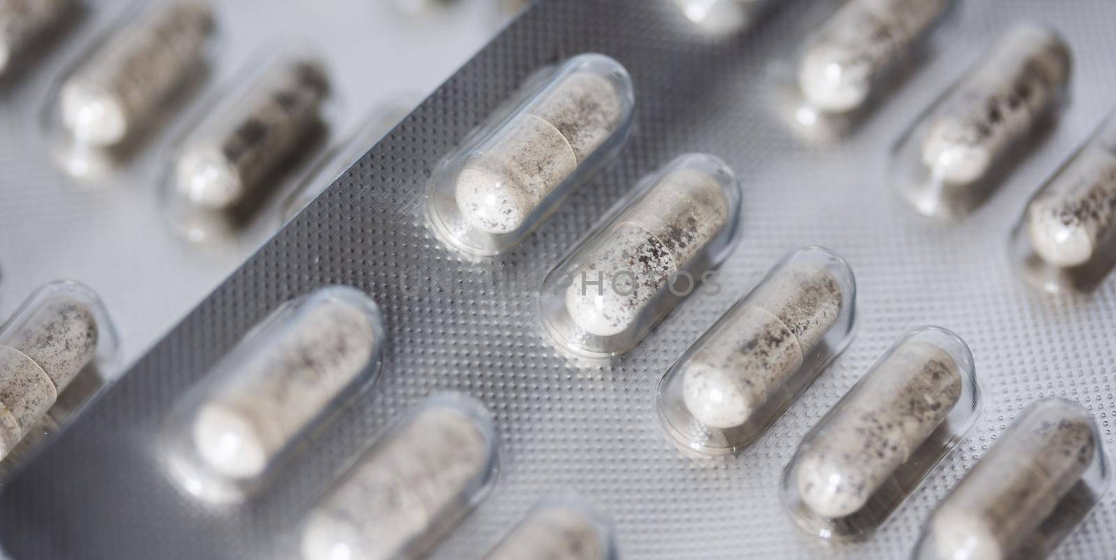 Pills / medicine lying on the table, flu season, close up