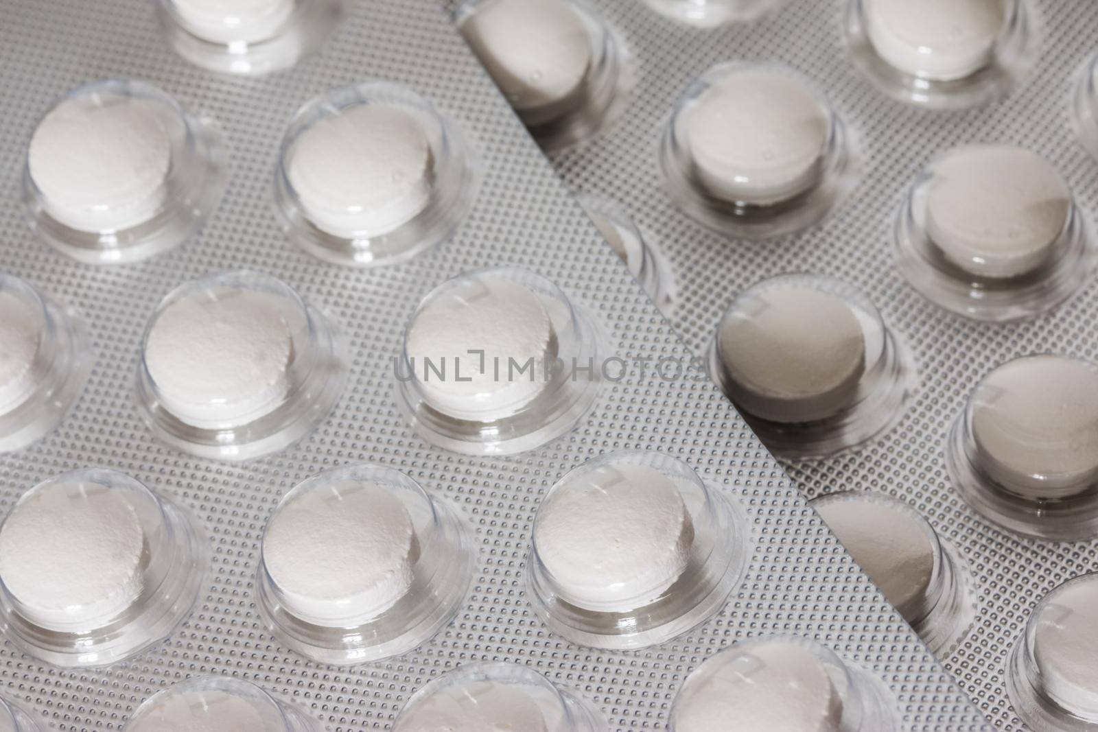 Pills / medicine lying on the table, flu season, close up