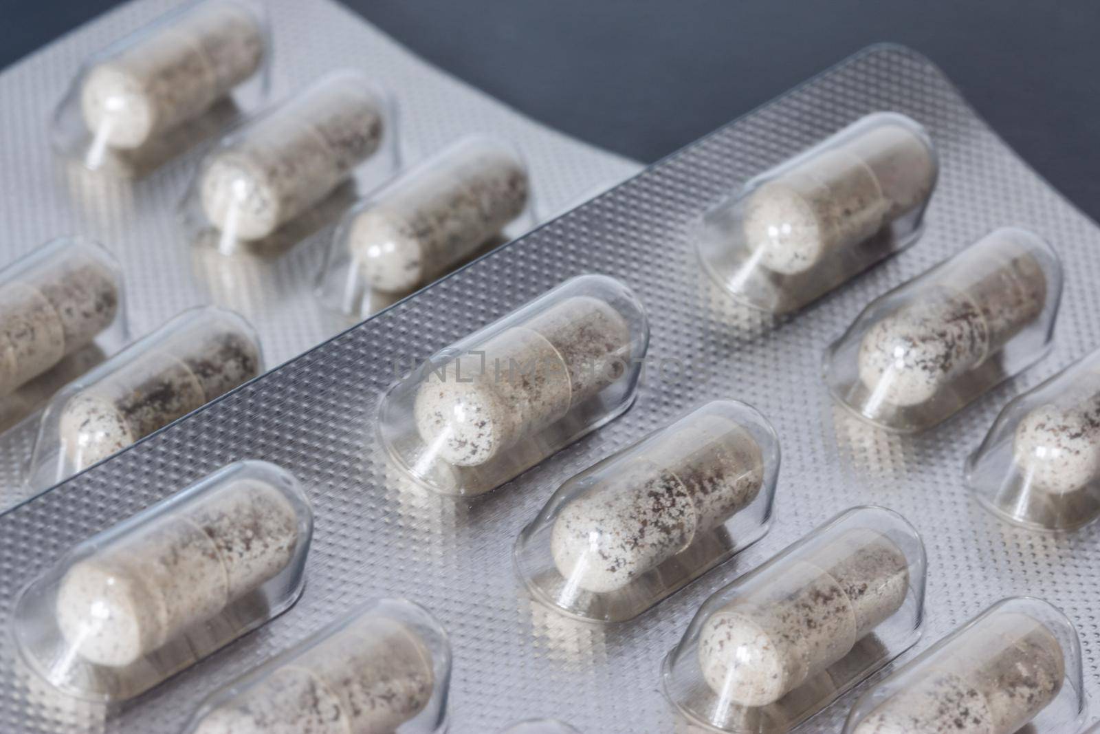 Pills / medicine lying on the table, flu season, close up