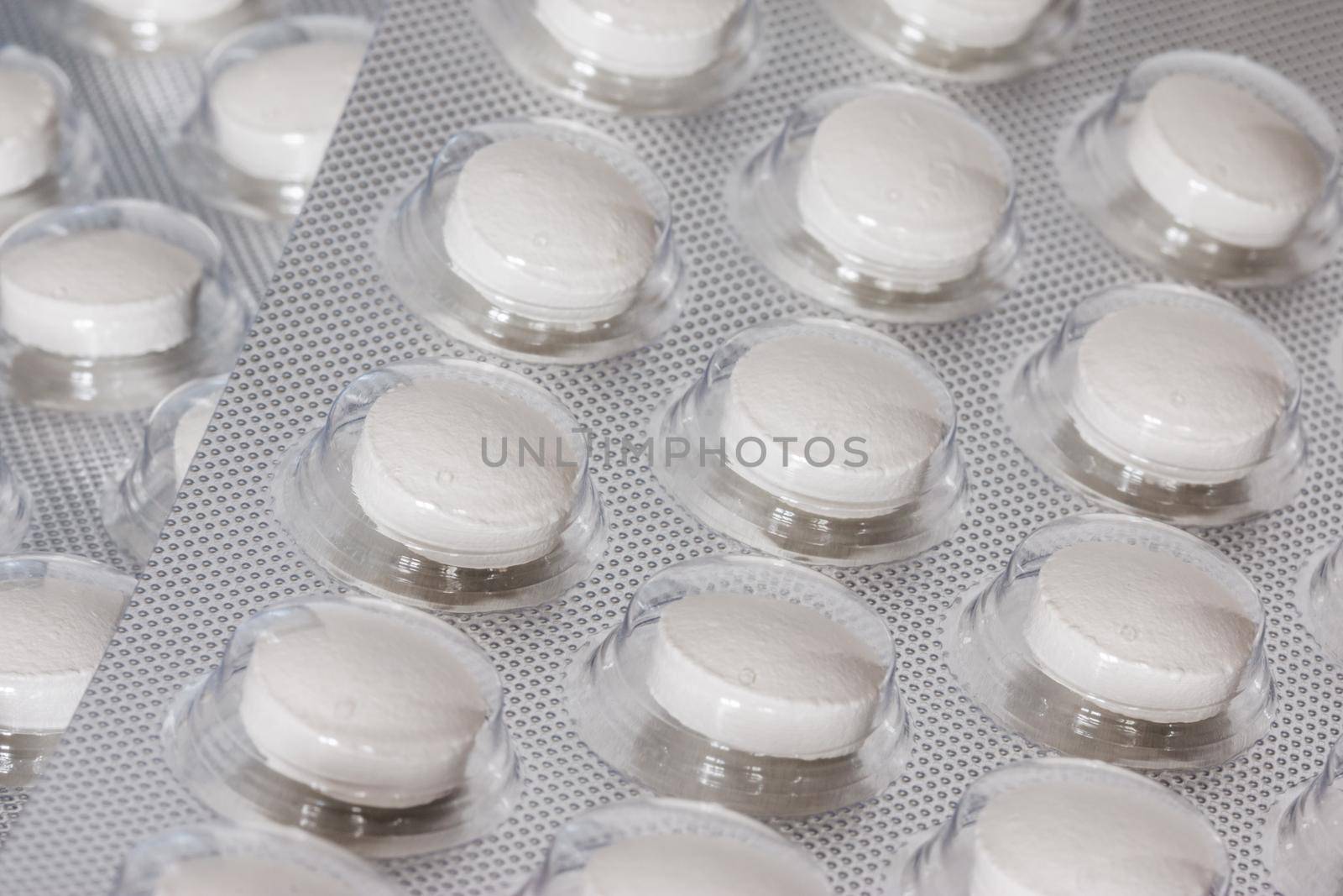 Pills / medicine lying on the table, flu season, close up