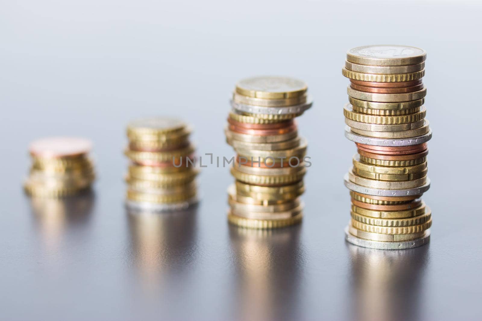 Coins stacked on each other, close up picture, money concept
