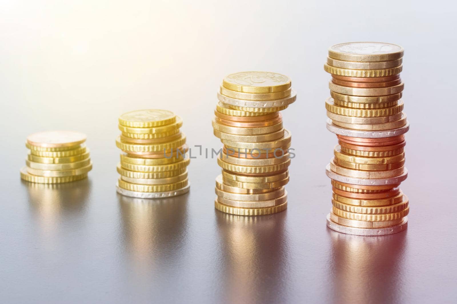 Coins stacked on each other, close up picture, money concept