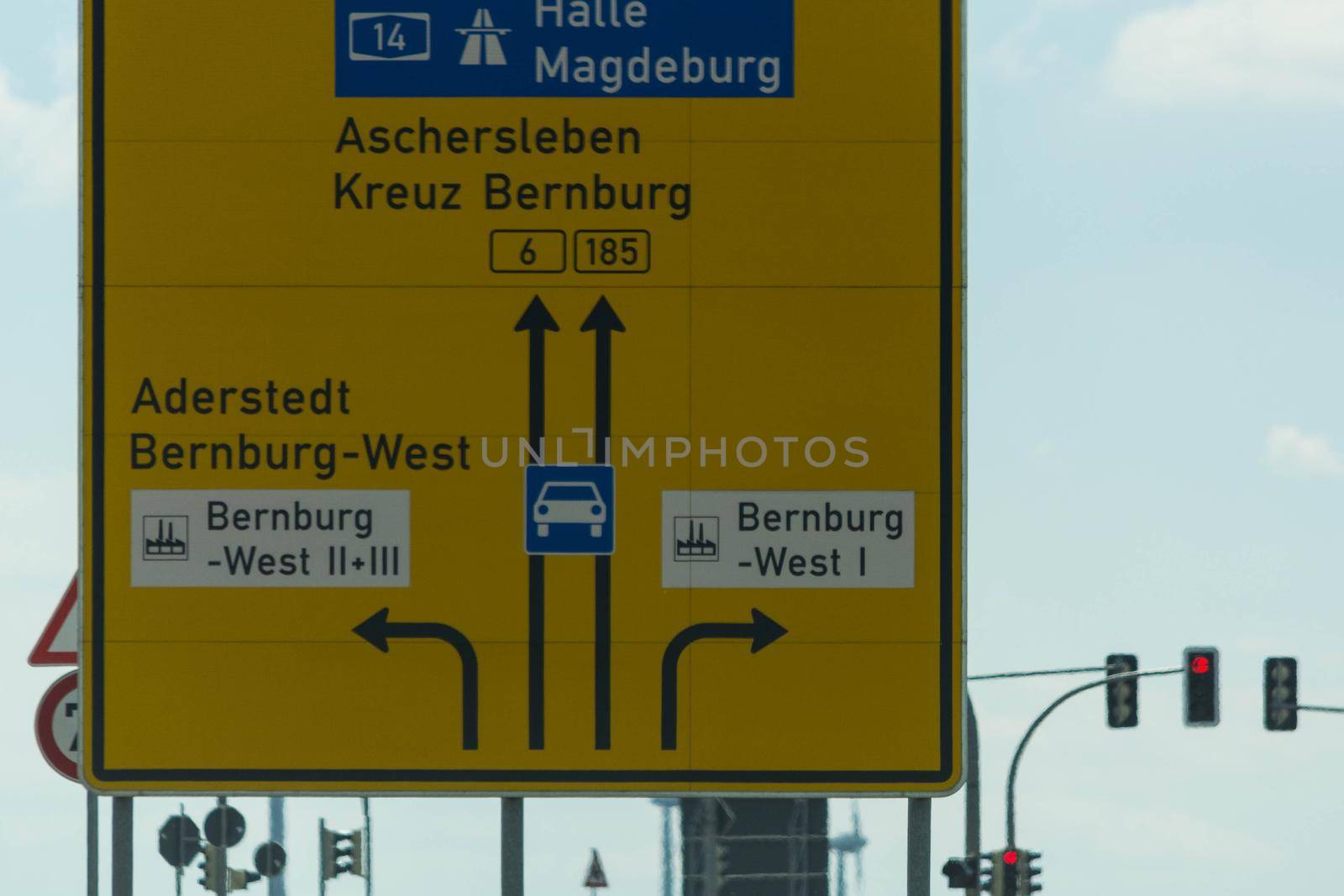 Street signs at the german highway showing the road to Magdeburg, Halle