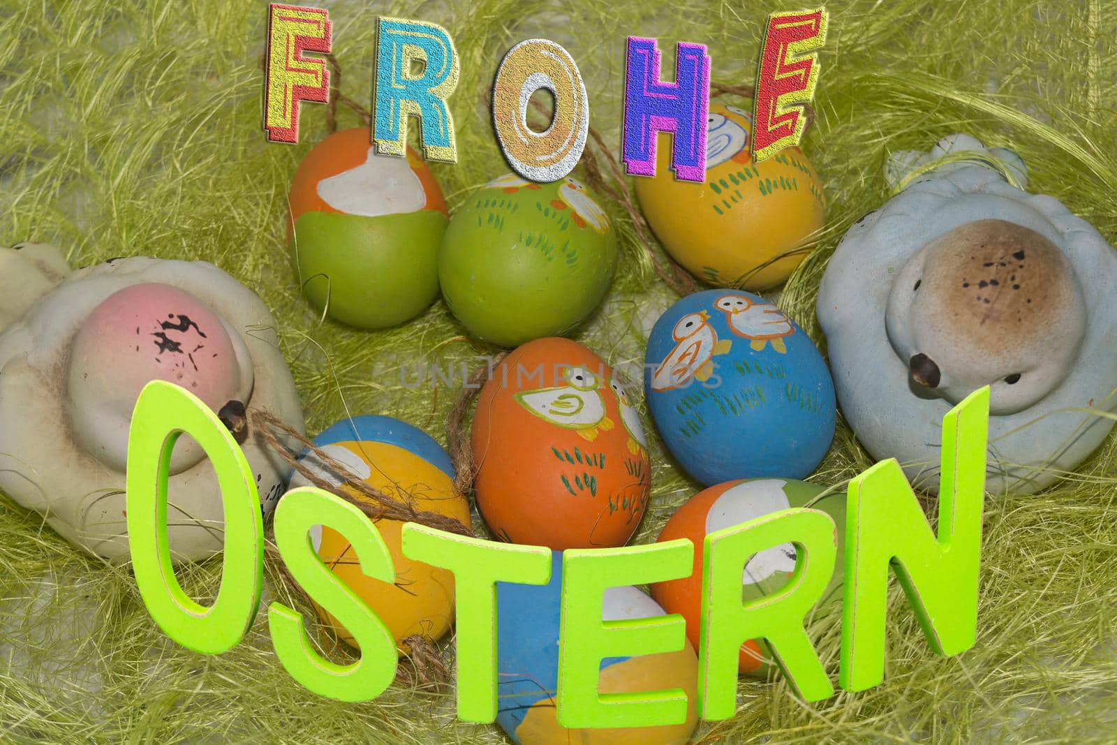 Colorful eggs in the basket on green grass  Background